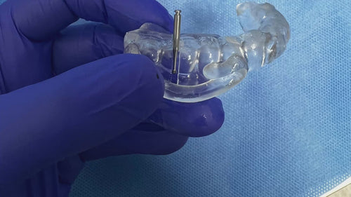 HemiGUIDE endodontic surgical guide showing precise lower molar hemisection with real surgery footage and post operative x ray results